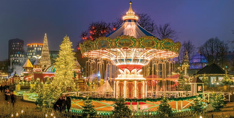 The carousel at Tivoli Gardens illuminated at Christmastime